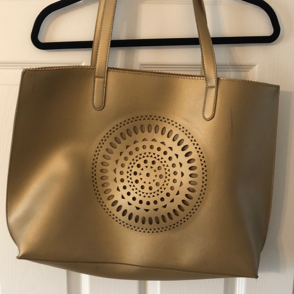 Neiman Marcus Gold Tote with Intricate Cutout Design